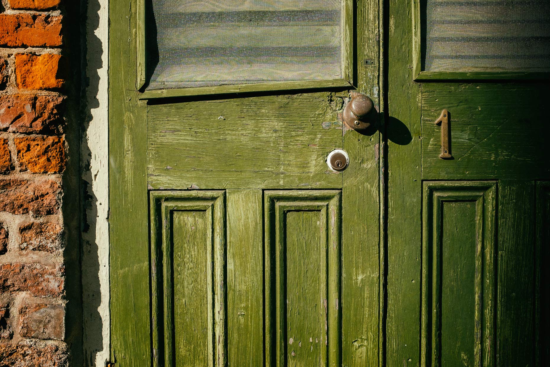 Green door in New Orleans by photographer Kevin Brown