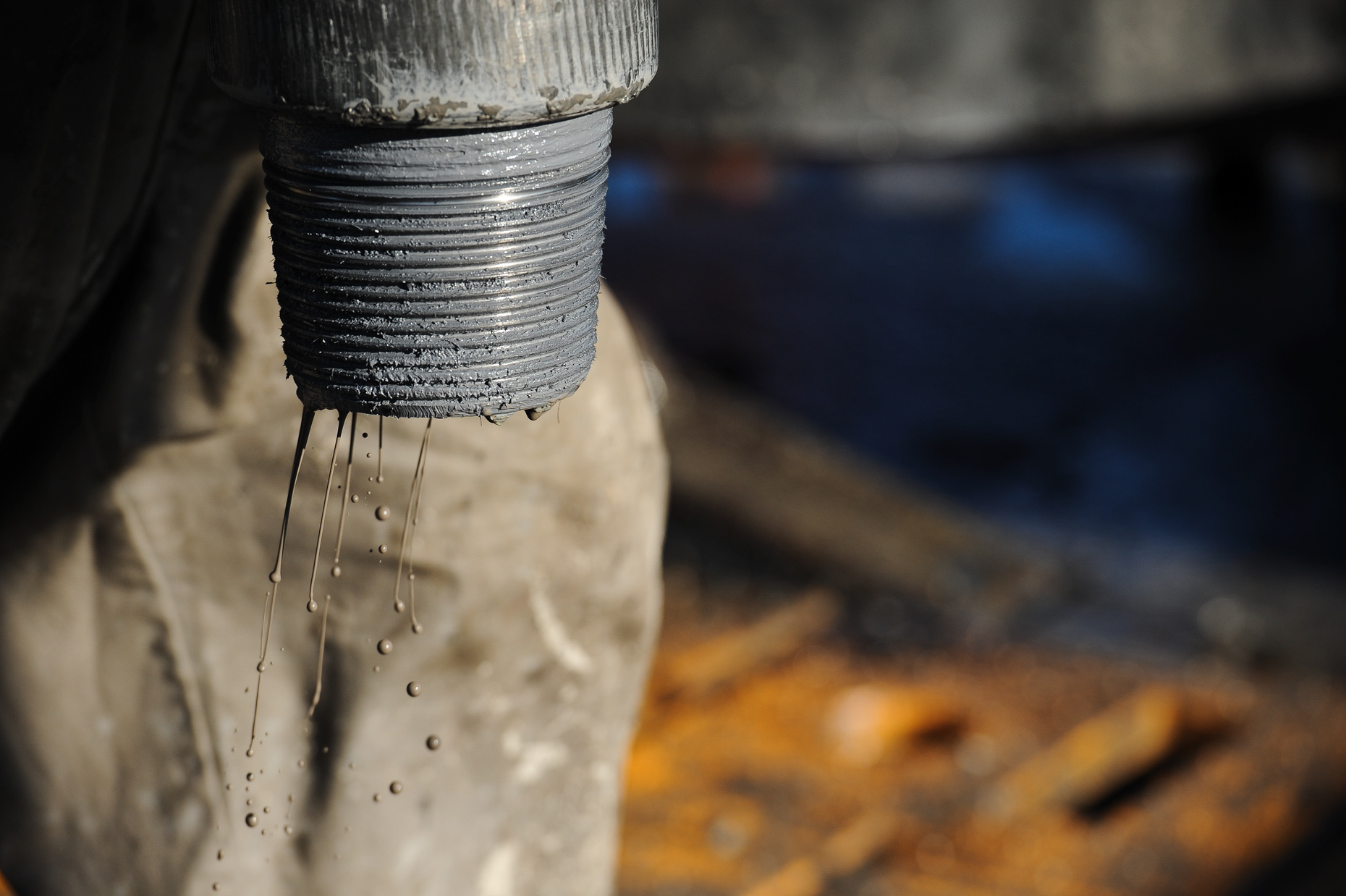 Mud dripping from drilling pipe west of Fort Worth, photographed by Kevin Brown.
