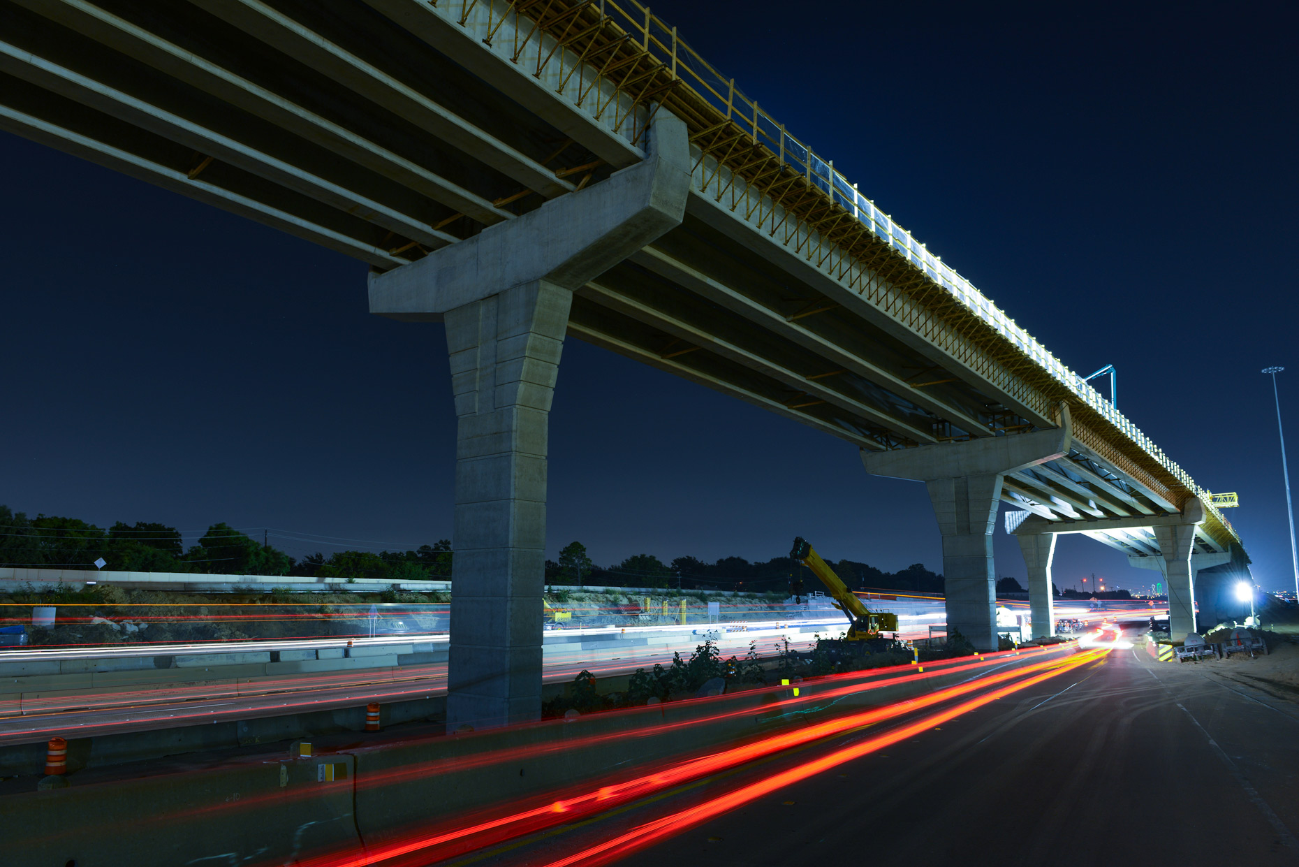 Road construction at night in Grand Prairie, Texas by industrial photographer Kevin Brown.